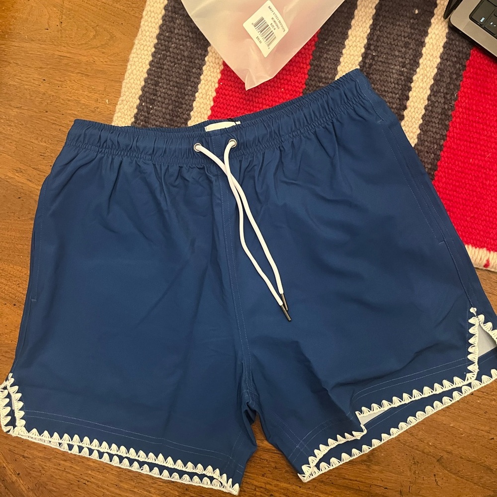Blue Swim Trunks with White Trim